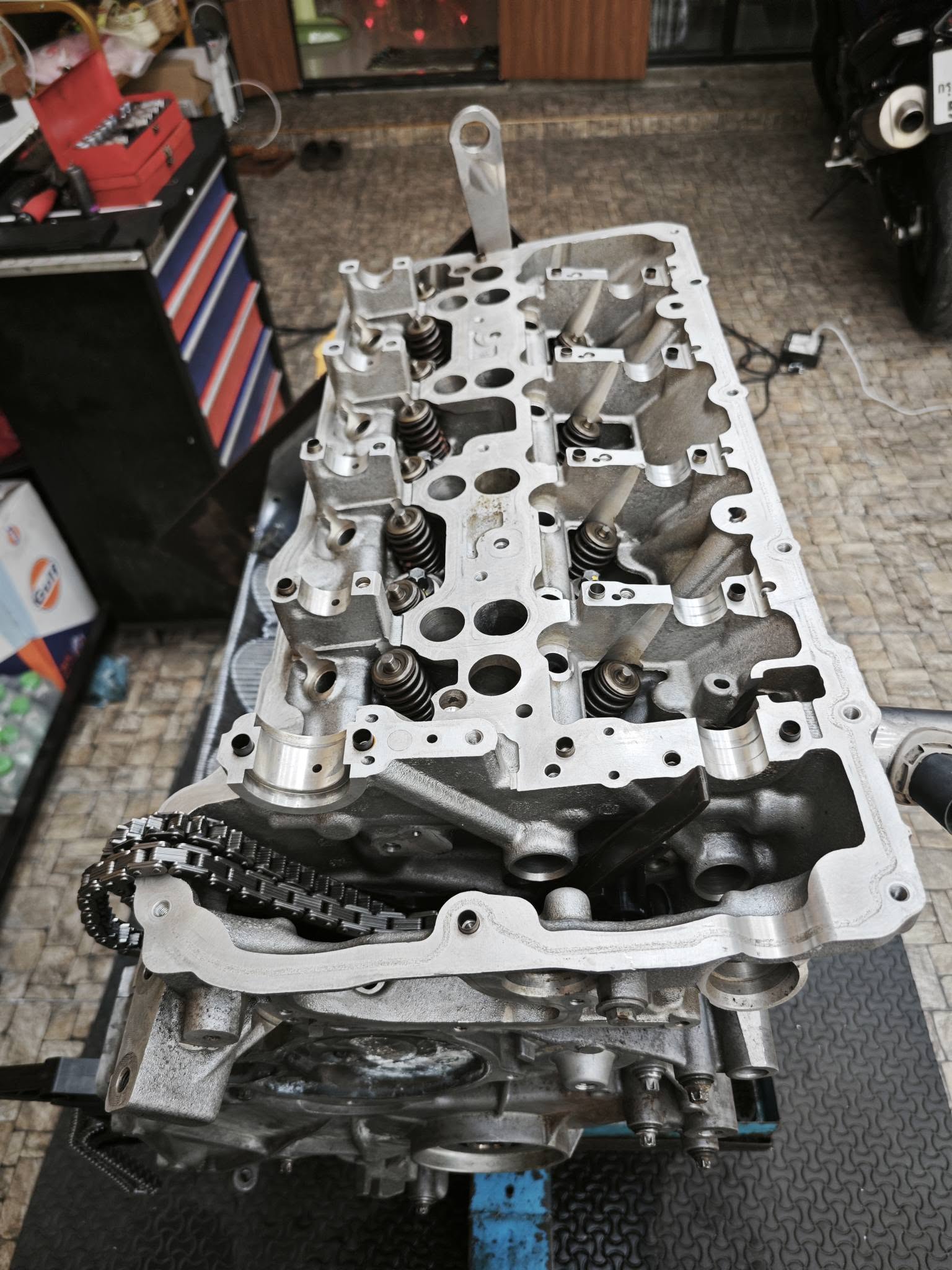 Modern timing-chain engine being serviced